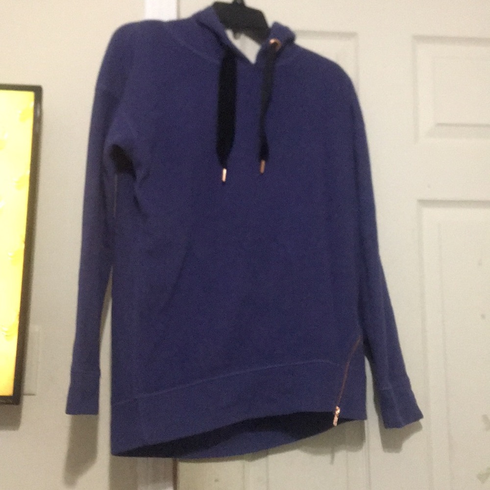 A long royal purple sweatshirt